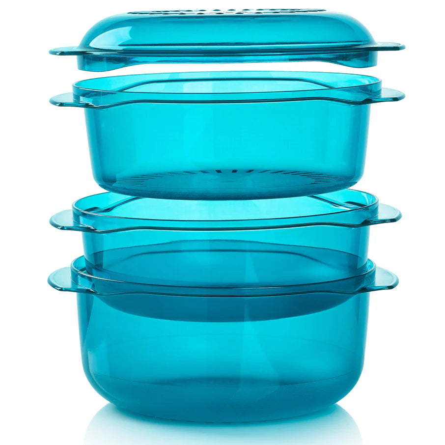 Set of three turquoise food containers with lids on a white background